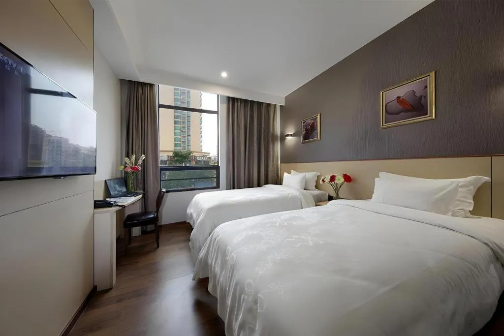 Bed in Hanyong Hotel Shenzhen International Exhibition Center