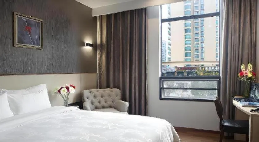 Bed in Hanyong Hotel Shenzhen International Exhibition Center