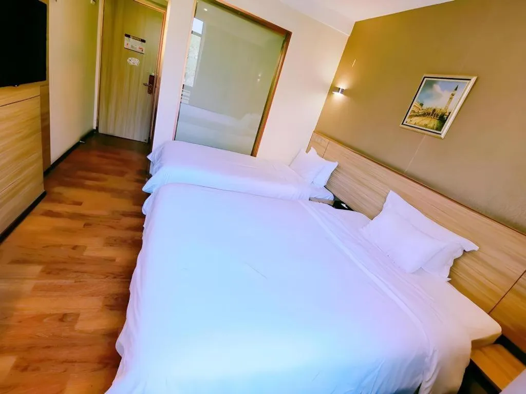 Bed in Hanyong Hotel Shenzhen International Exhibition Center