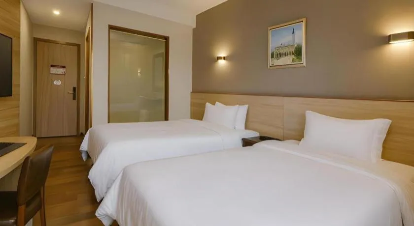 Bed in Hanyong Hotel Shenzhen International Exhibition Center