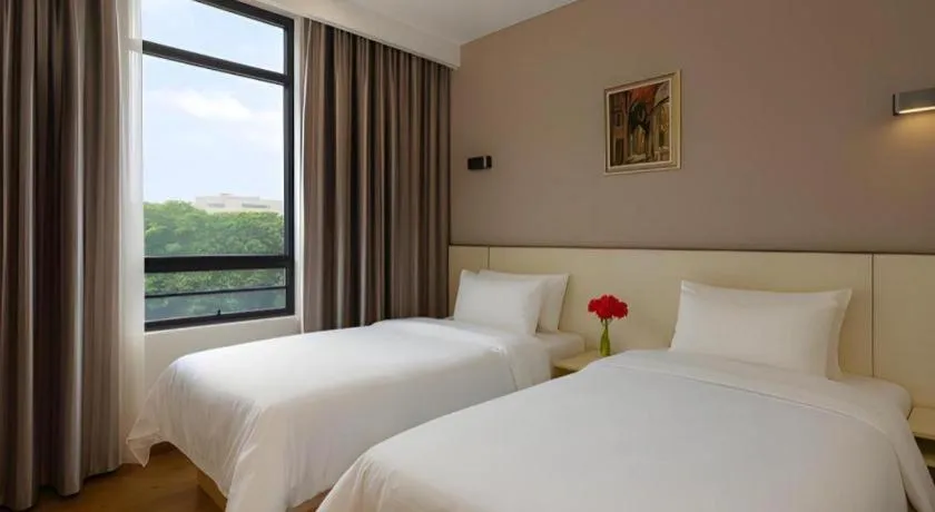 Bed in Hanyong Hotel Shenzhen International Exhibition Center