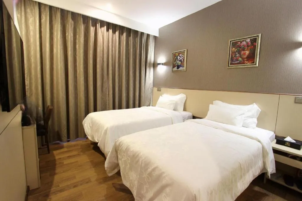 Bed in Hanyong Hotel Shenzhen International Exhibition Center