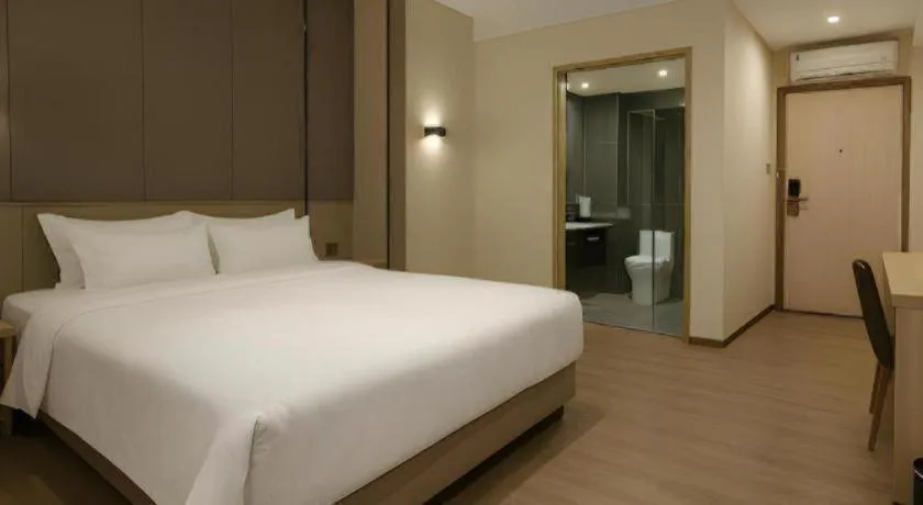 Bed in Hanyong Hotel Shenzhen International Exhibition Center