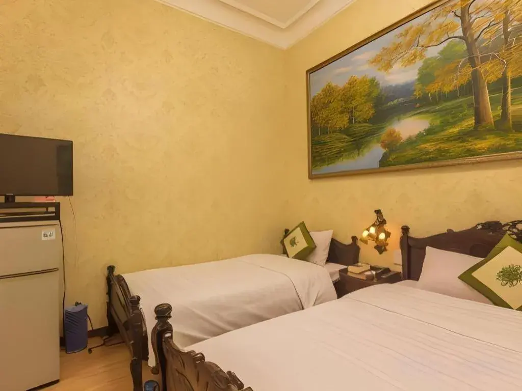 Bed in Dragon Hotel Bed in Dragon Hotel