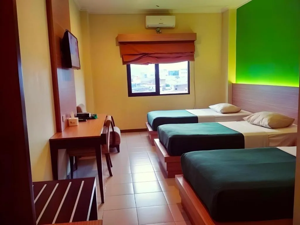 Bed in Muria Hotel