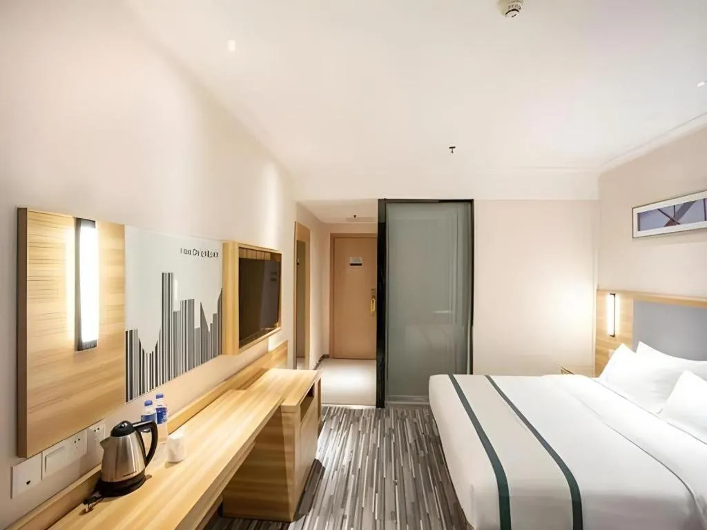 Bed in City Comfort Inn Hengyang Dayang Department Lianhu Plaza