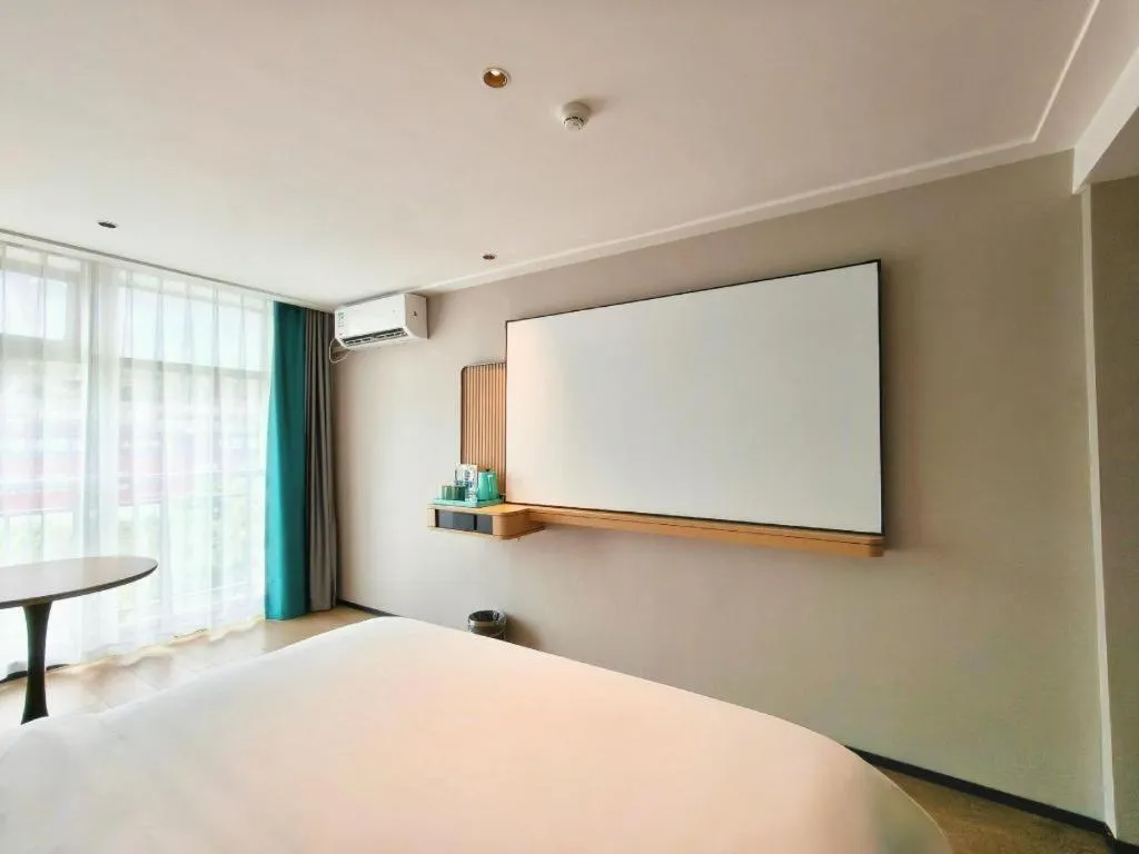 Bed in City Comfort Inn Hengyang Dayang Department Lianhu Plaza