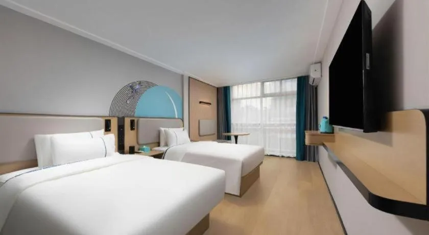 Bed in City Comfort Inn Hengyang Dayang Department Lianhu Plaza
