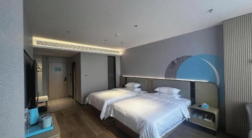 Bed in City Comfort Inn Hengyang Dayang Department Lianhu Plaza