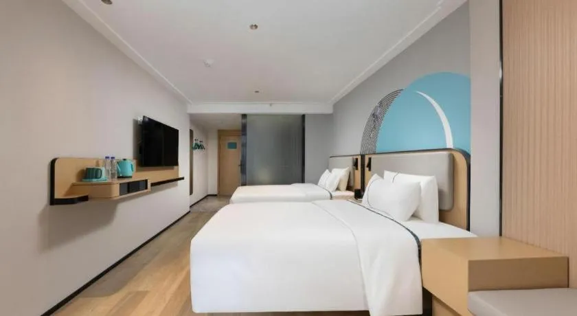 Bed in City Comfort Inn Hengyang Dayang Department Lianhu Plaza