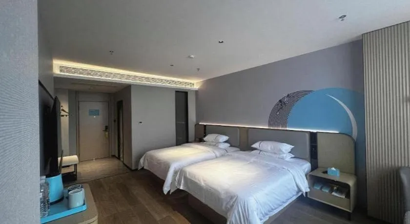 Bed in City Comfort Inn Hengyang Dayang Department Lianhu Plaza