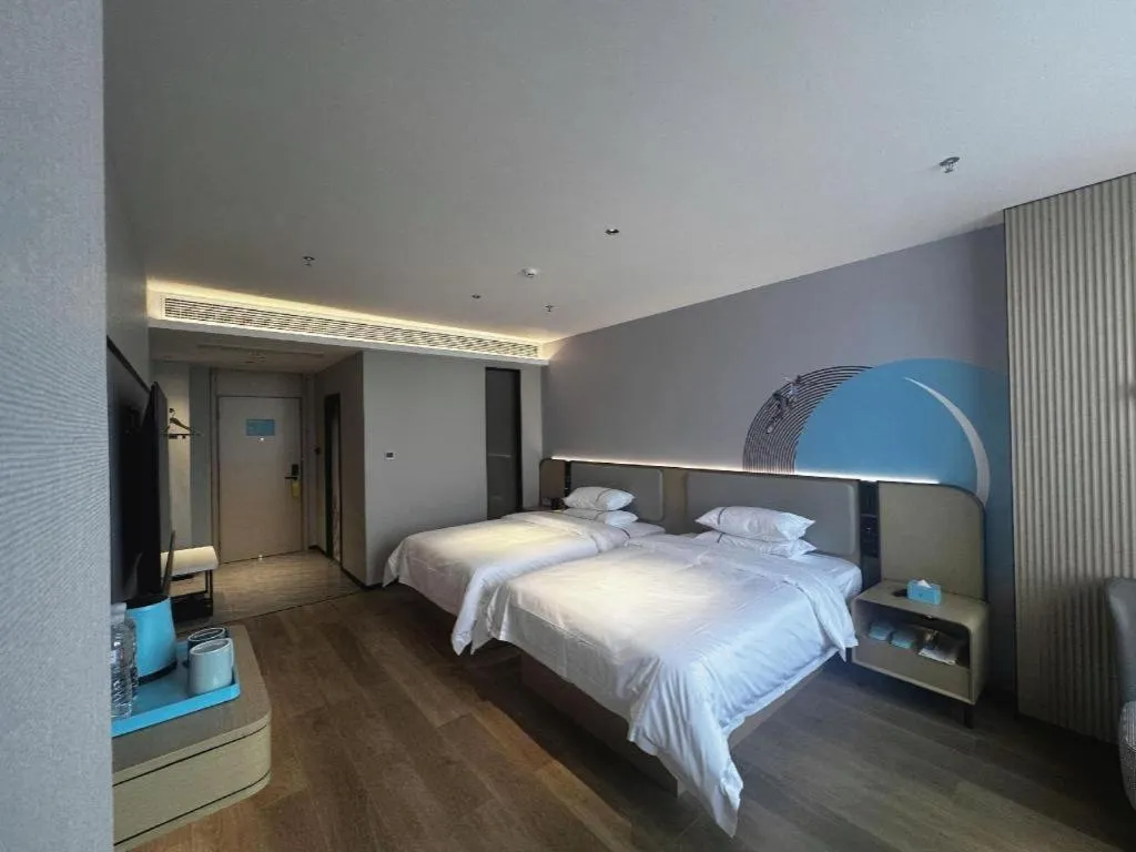 Bed in City Comfort Inn Hengyang Dayang Department Lianhu Plaza