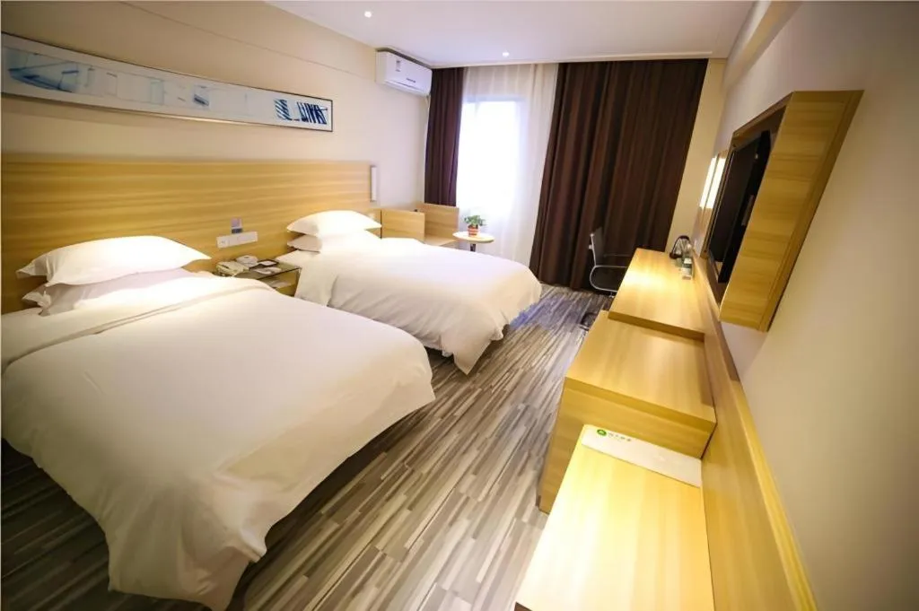Bed in City Comfort Inn Hengyang Dayang Department Lianhu Plaza