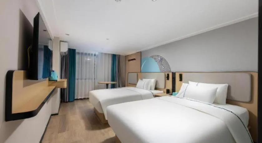 Bed in City Comfort Inn Hengyang Dayang Department Lianhu Plaza