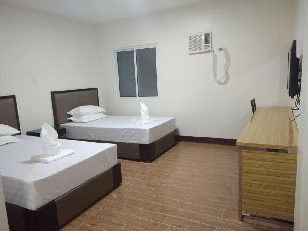 Bed in Meaco Royal Hotel- ILagan