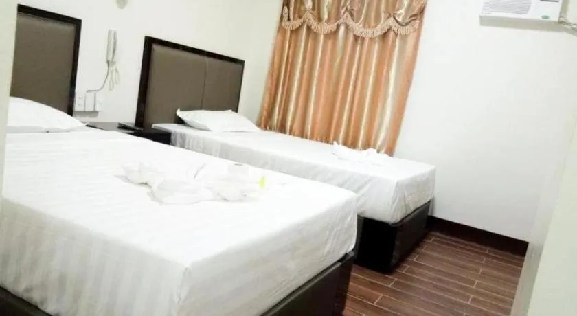 Bed in Meaco Royal Hotel- ILagan