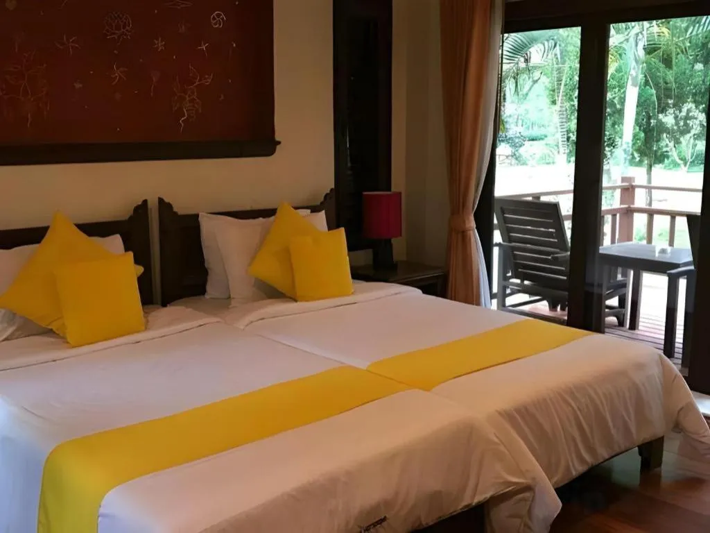 Bed in Pai Hotsprings Spa Resort