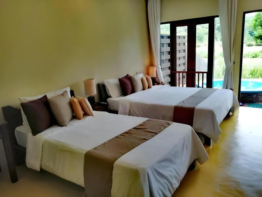 Bed in Pai Hotsprings Spa Resort