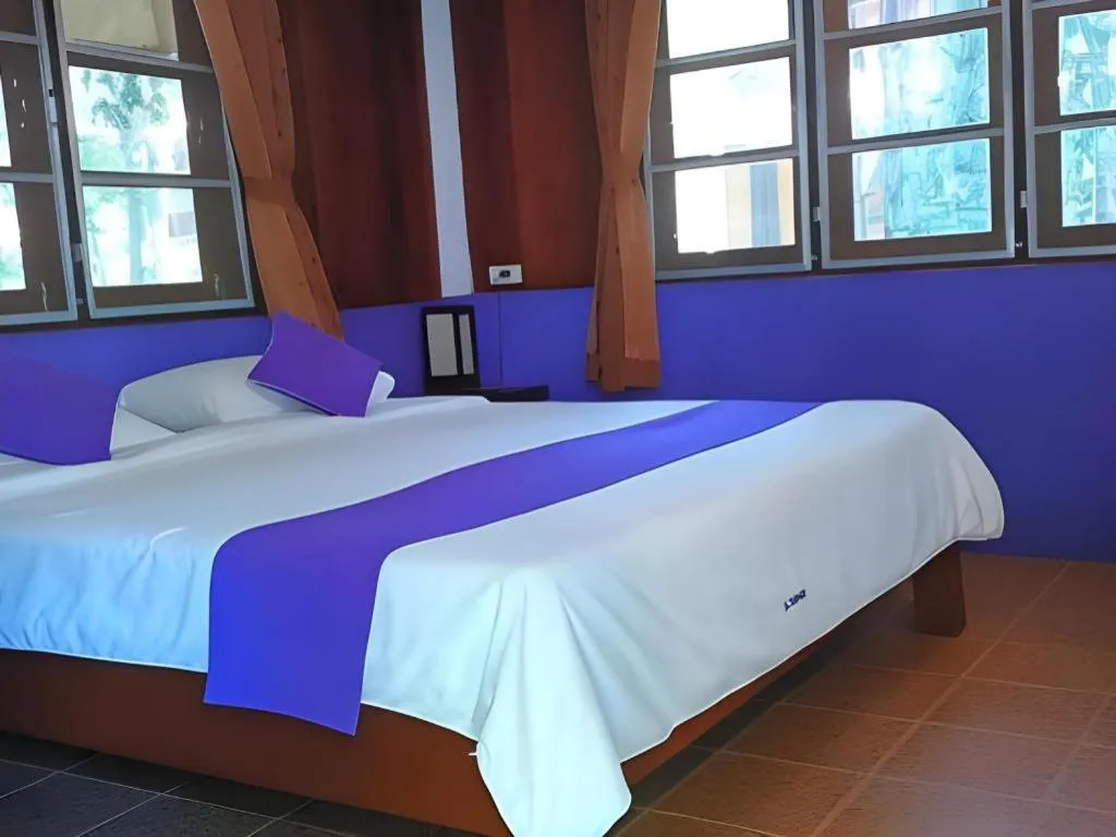 Bed in Pai Hotsprings Spa Resort