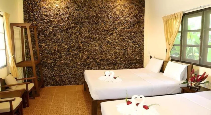 Bed in Pai Hotsprings Spa Resort