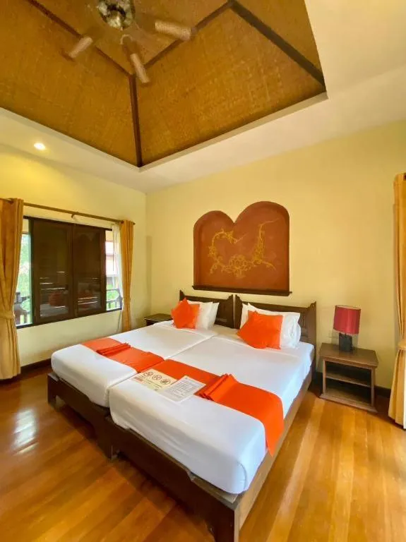 Bed in Pai Hotsprings Spa Resort