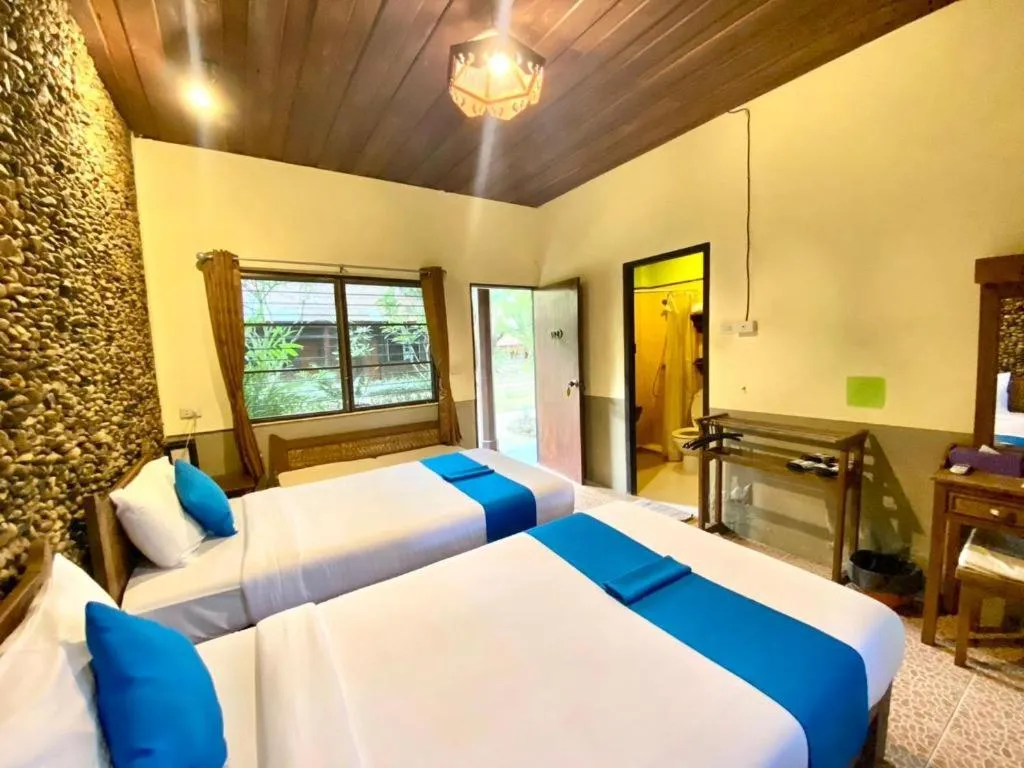 Bed in Pai Hotsprings Spa Resort