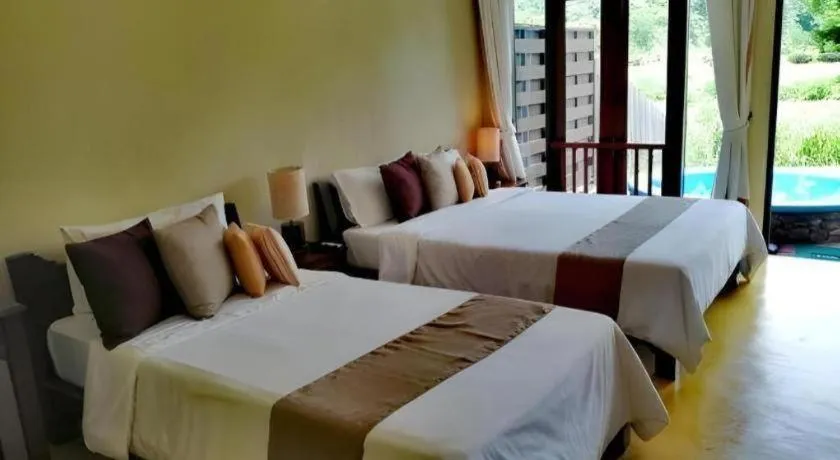 Bed in Pai Hotsprings Spa Resort
