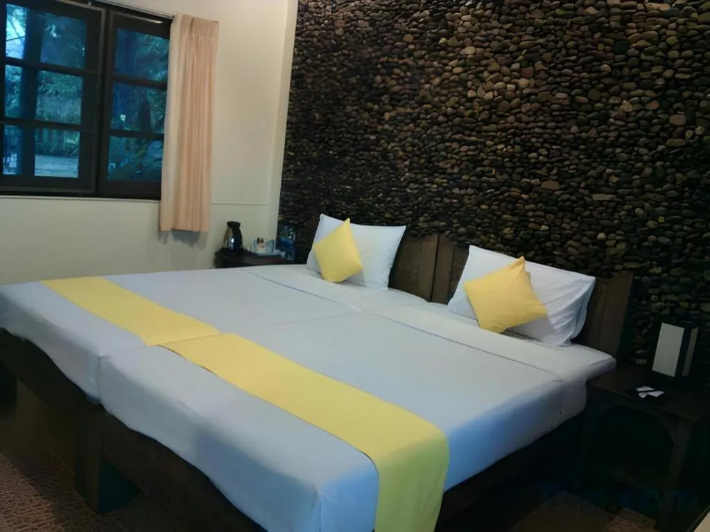 Bed in Pai Hotsprings Spa Resort