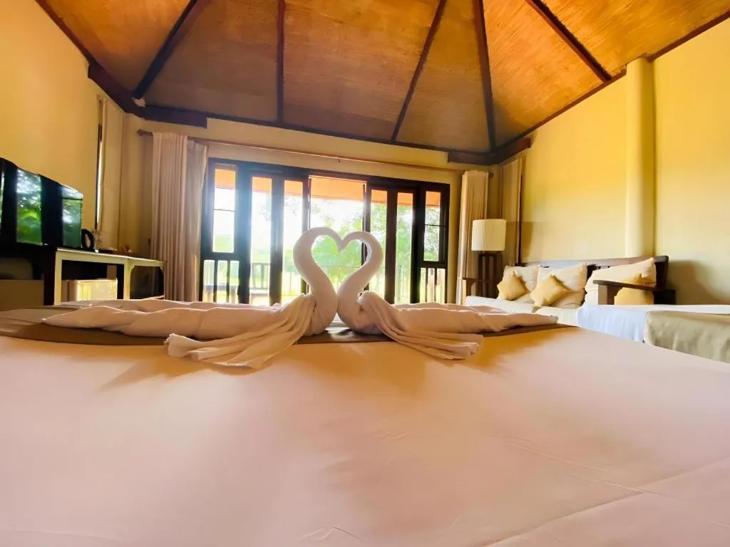 Bed in Pai Hotsprings Spa Resort