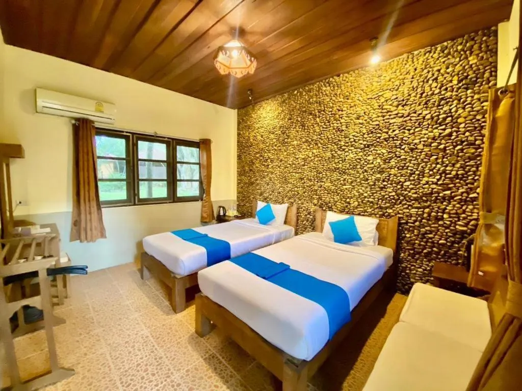 Bed in Pai Hotsprings Spa Resort