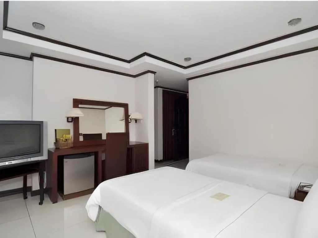 Bed in Soledad Suites