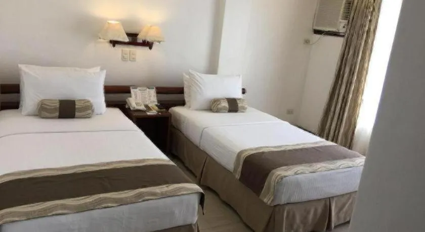 Bed in Soledad Suites