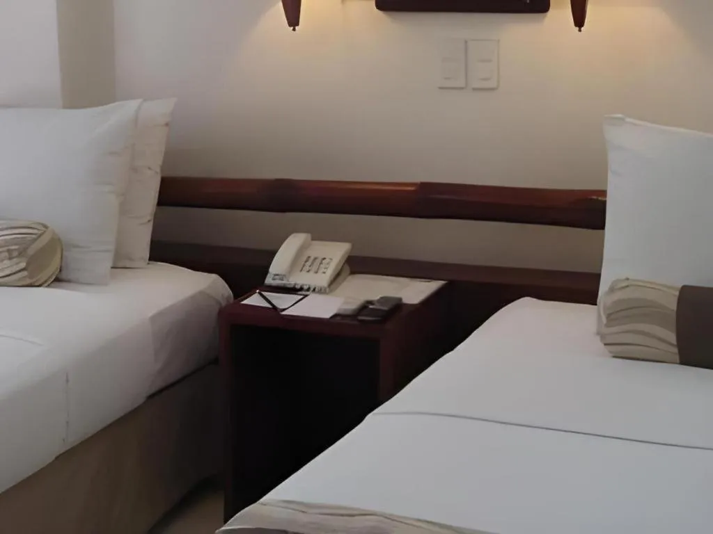 Bed in Soledad Suites