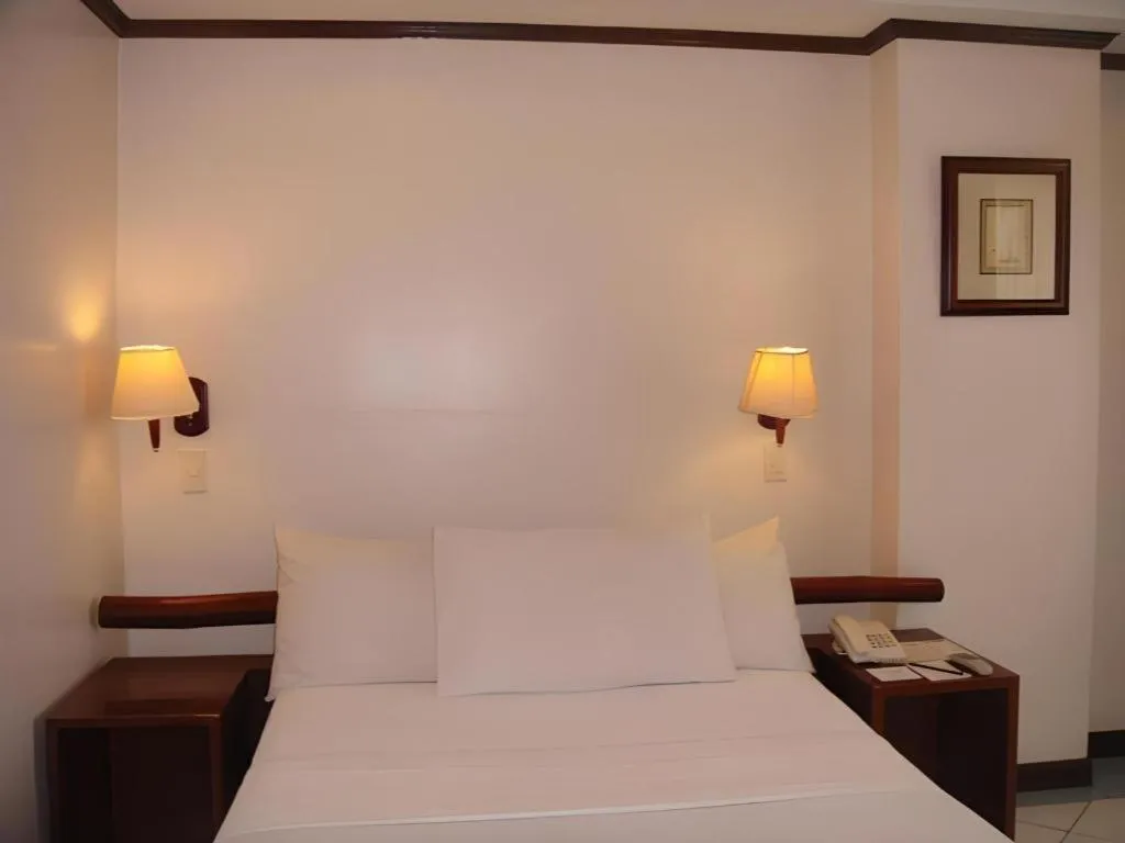 Bed in Soledad Suites