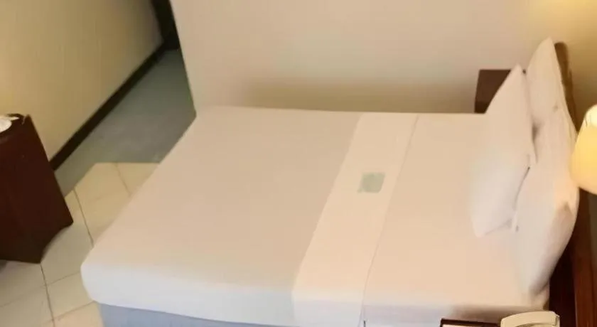 Bed in Soledad Suites