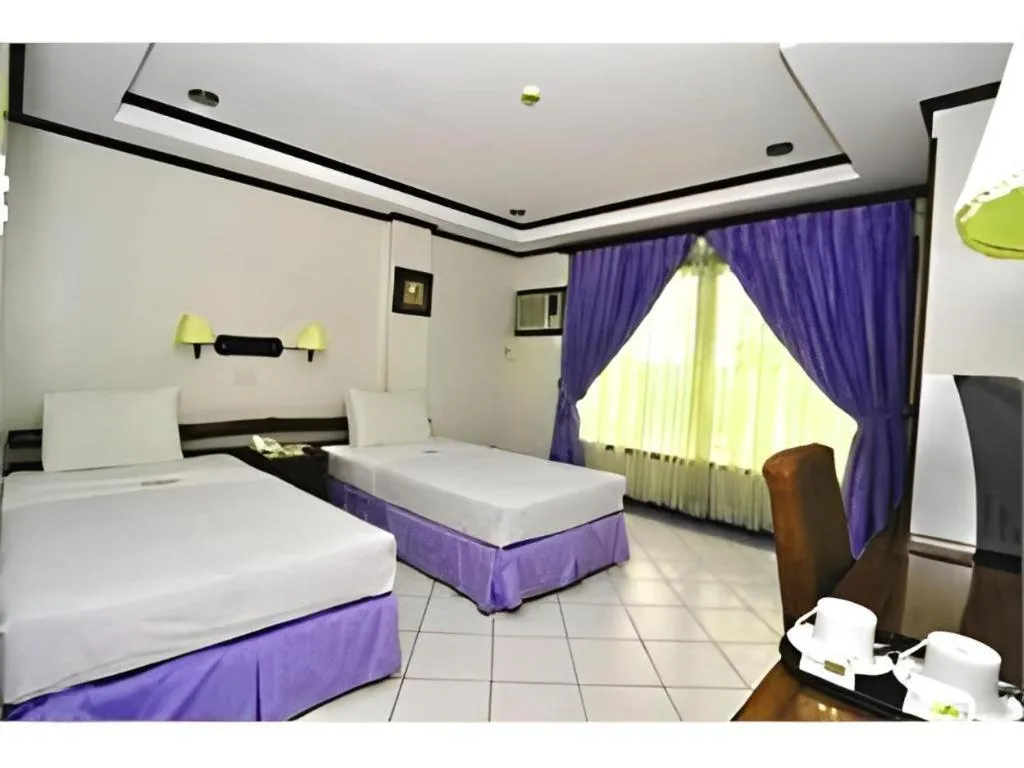 Bed in Soledad Suites