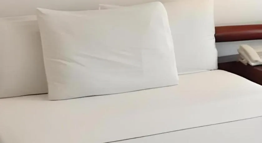 Bed in Soledad Suites