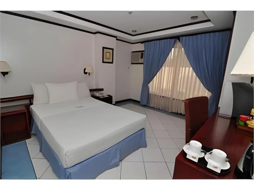 Bed in Soledad Suites