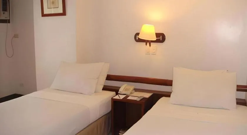 Bed in Soledad Suites