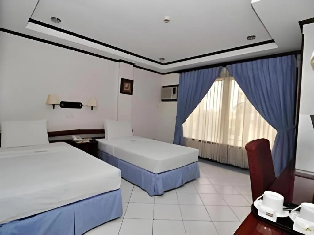 Bed in Soledad Suites