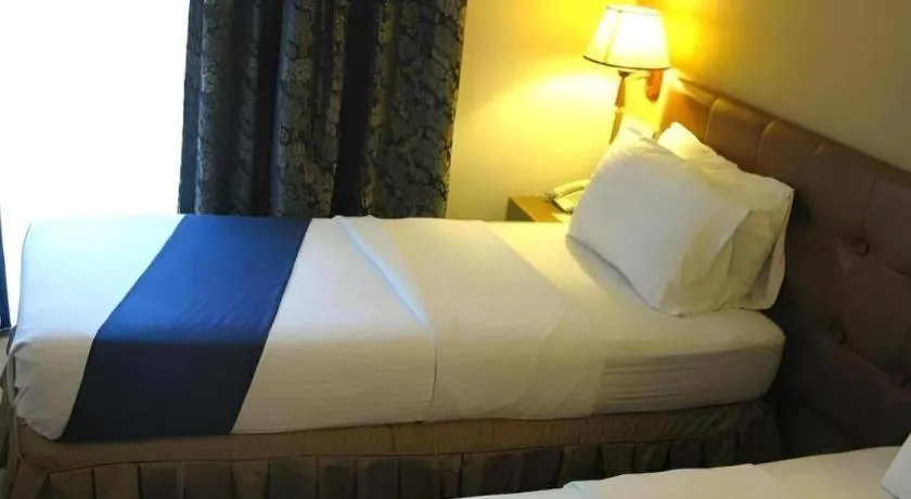 Bed in Blueberry Tourist Hotel