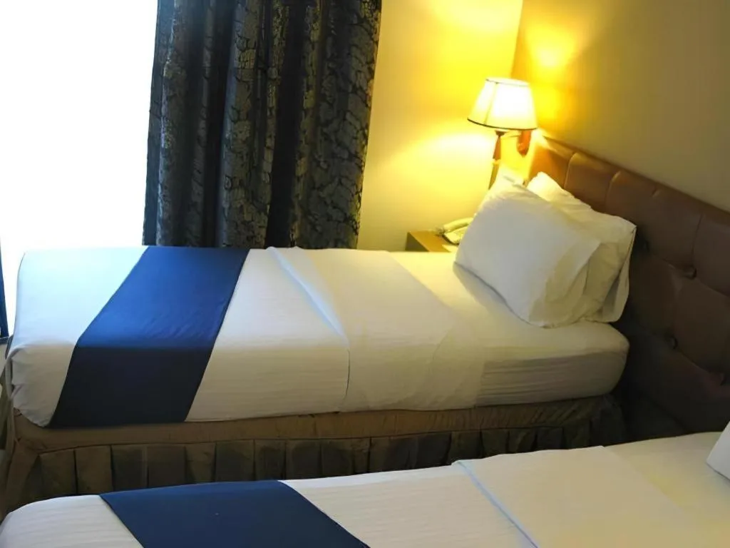 Bed in Blueberry Tourist Hotel