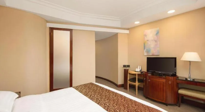 Bed in Jinrong International Hotel
