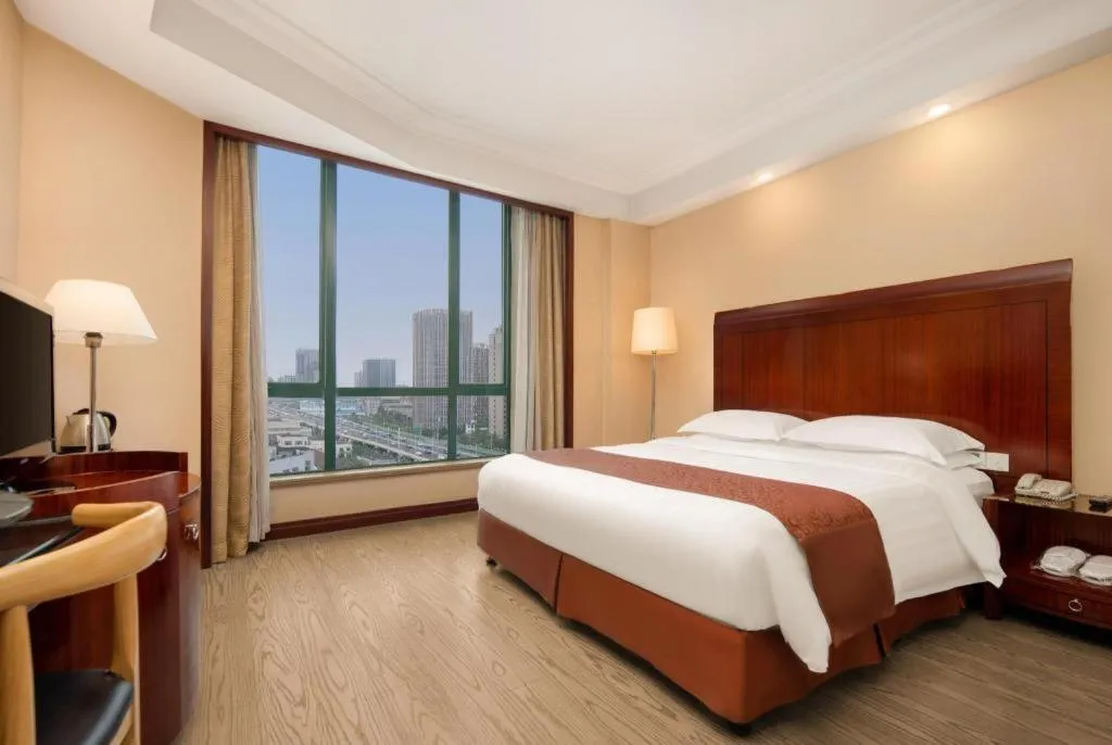 Bed in Jinrong International Hotel
