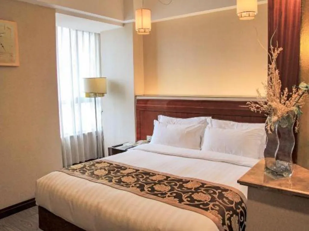 Bed in Jinrong International Hotel