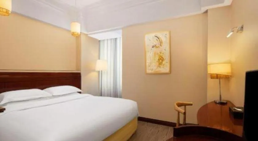 Bed in Jinrong International Hotel