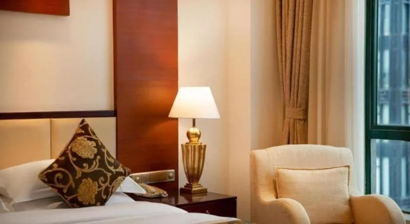 Bed in Jinrong International Hotel