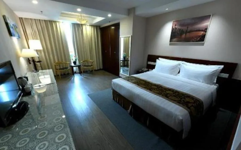 Bed in Jinrong International Hotel