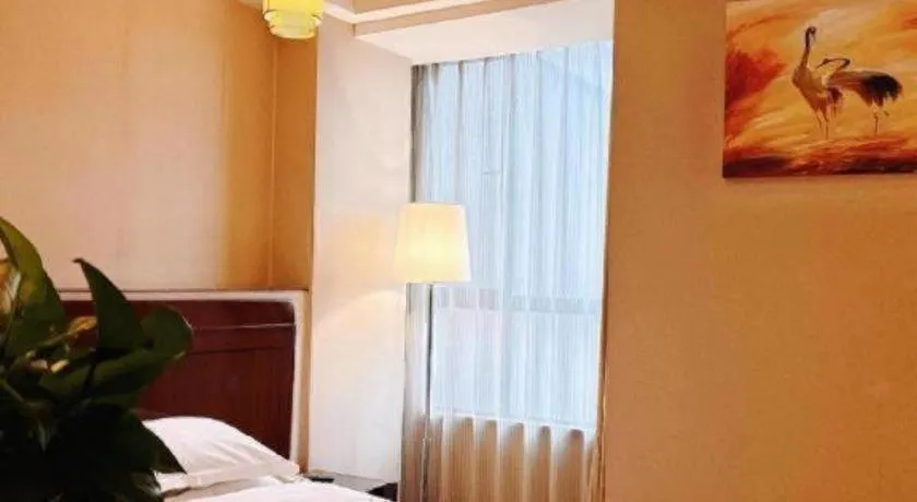 Bed in Jinrong International Hotel