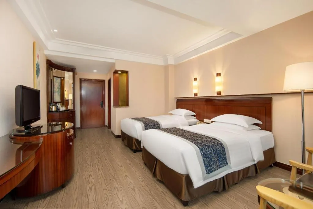 Bed in Jinrong International Hotel